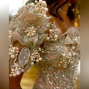 A custom handmade NYC couture gown. Worn once, in great condition!